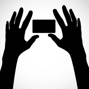 两只手用手指分散开,并且卡.您设计的的剪影元素照片