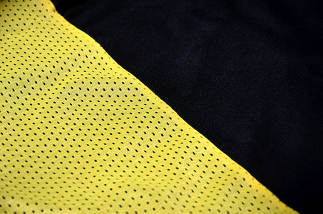 黄色运动服装织物纹理背景