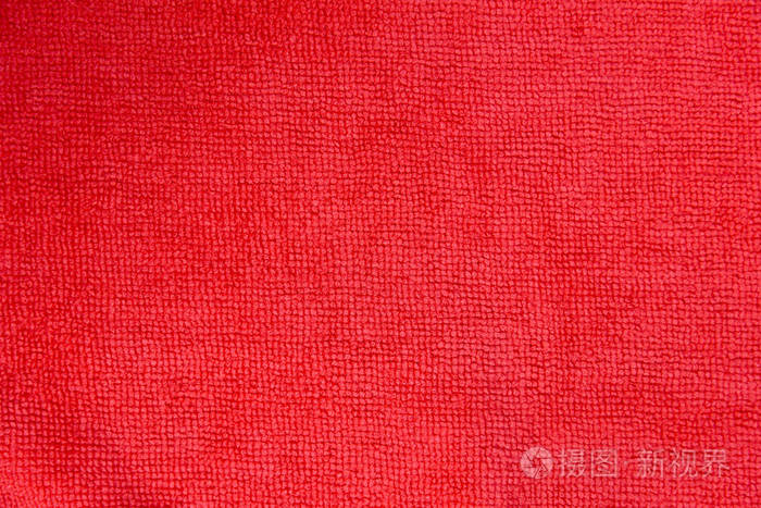 近摄镜头的红色超细纤维布纹理背景