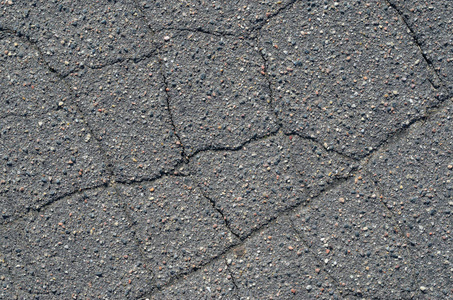 有裂缝的沥青纹理照片