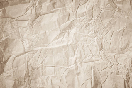 空白报纸素材关闭皱纹纹理光泽纸.光定调子艺术照片