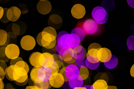 抽象的黄色紫色灯景背景