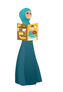 成功的穆斯林商业女人读杂志
