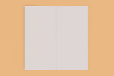 空白的白色两折小册子样机上橙色背景