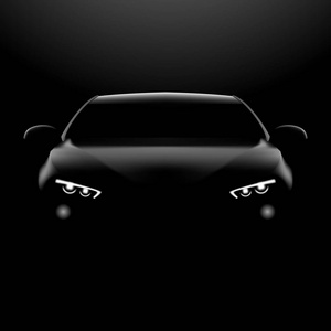 现实的汽车在黑暗中.前视图照片