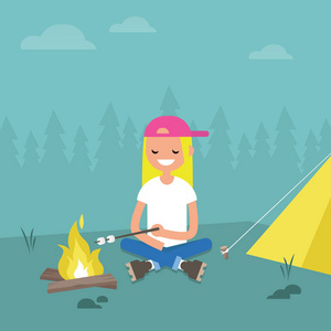 在森林中露营。烤在火上的棉花糖的年轻女性角色