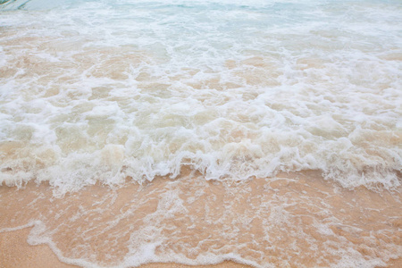 蓝色的大海与沙滩软波的抽象模糊的背景