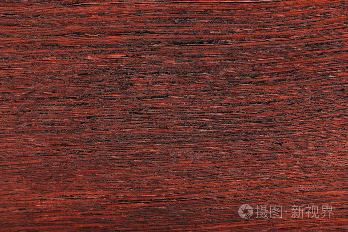 木制的背景。老的抛光木材的纹理。红色的树