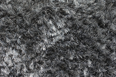 特写地毯纤维在黑色和白色