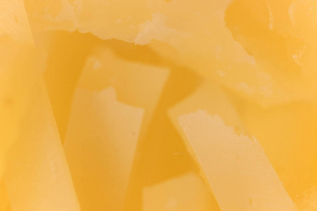 固体奶酪宏观特写镜头。背景纹理
