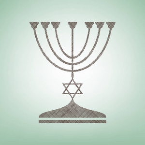 在黑色剪影的犹太烛台烛台。矢量。与光斑中心的绿色背景上的褐色亚麻图标