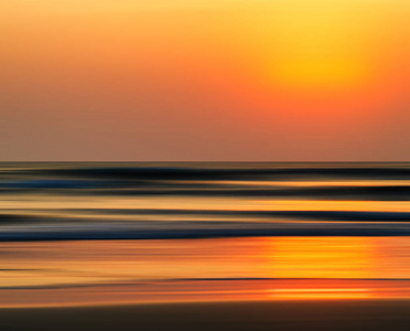水平生动橙色金色印度洋日落运动抽象