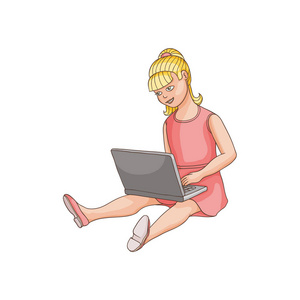 十几岁的女孩使用笔记本电脑坐在地板上