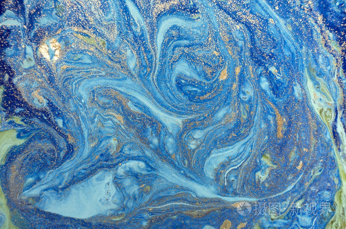 大理石与金色亮片蓝色抽象背景.液体的大理石墨迹模式