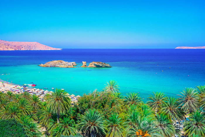 棕榈树 蓝绿色水和热带海滩，奥钢联，希腊克里特岛山水风景