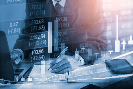 贸易股票商人在股票市场金融贸易指标背景照片