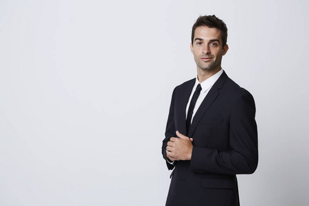 自信的商人在黑色西装照片