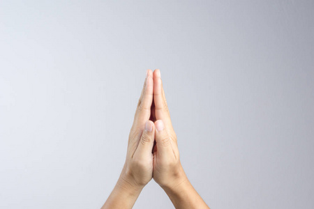 佛友泰国白色背景的佛教祈祷手势或问候文化照片