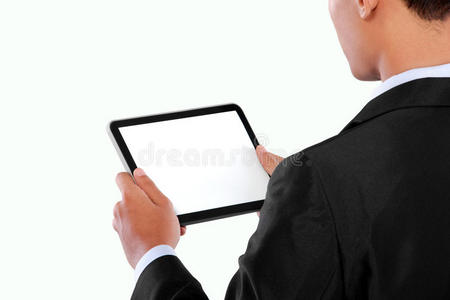 一位商人使用平板电脑的照片