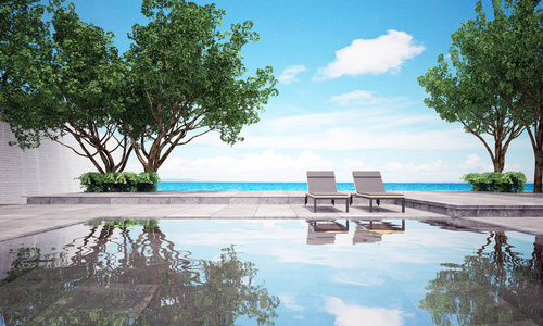 海滩休息室的室内设计与沙发和海景照片