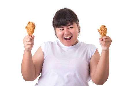 肥胖亚洲妇女藏品和吃炸鸡被隔绝