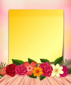 黄色记事本和五颜六色的花朵