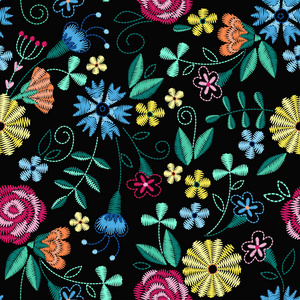刺绣无缝图案与美丽的花朵。黑色背景上的矢量花卉装饰。用于时尚纺织品和织物的刺绣。