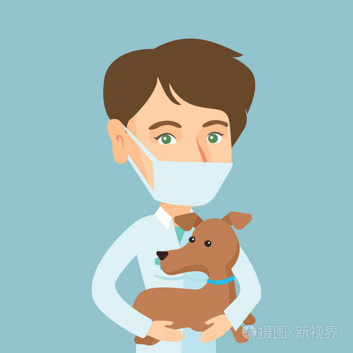 年轻的白人兽医手里拿着狗