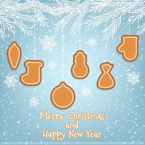 用圣诞姜饼装饰的明信片。节日快乐