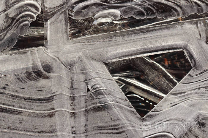 冰纹表面背景纹理冰冻湖面上冰线的波浪图