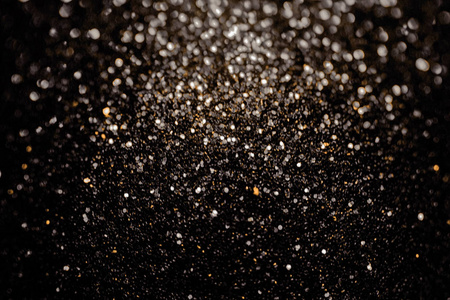 黑色闪光闪闪发光背景.黑色星期五闪亮的图案与亮片.