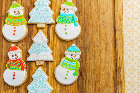 圣诞雪人和树饼干切割板冬季 selebration 背景