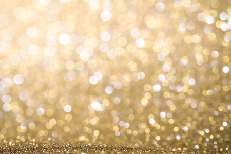 金色抽象圣诞闪烁明亮的背景与散 de