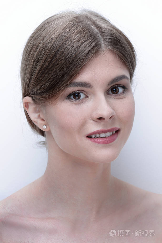 特写的一个美丽的年轻女人的脸