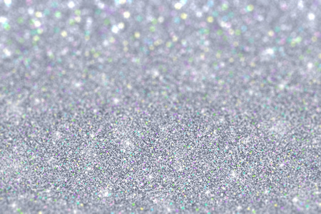 银色色银色闪光与色的微粒焦背景照片