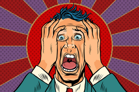 恐惧的人抱着他的头, 惊恐的脸年轻英俊的金发男人害怕和惊恐的表情用