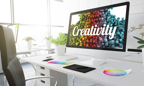 电脑屏幕创意工作室工作场所的创意文本和明亮的背景，表3D渲染彩色片