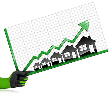 增长的房地产销售图表与房子