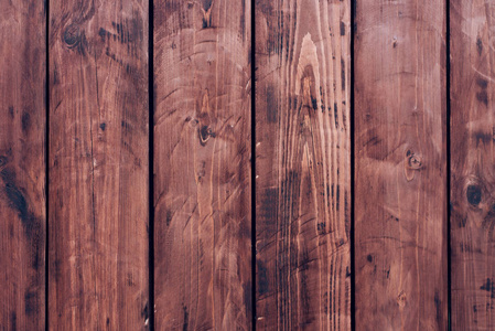 棕色木板栅栏黑暗的老式木板。背景和纹理围栏画。前视图。吸引美丽的葡萄酒