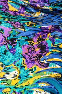 s scarf. Silk fabric is blue, floral pattern. Abstraction