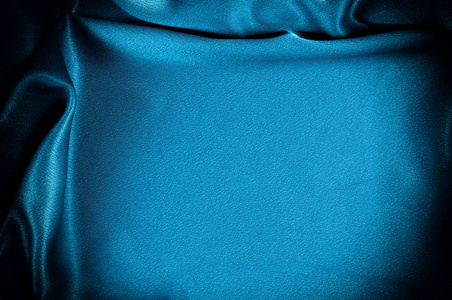 纹理背景。 模板。 丝绸面料，蓝色，蓝色，丝绸，窗帘和室内装潢面料，从庭院，深色窗帘，实心面料，背部和枕头。