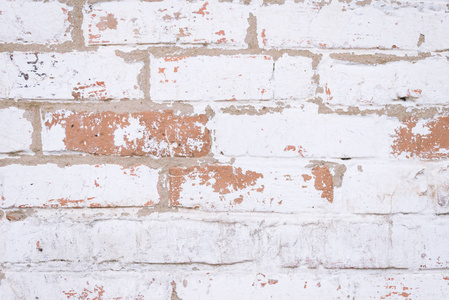 老红砖墙与破旧损坏的白色石膏图片
