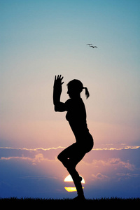 日落时瑜伽姿势的插图
