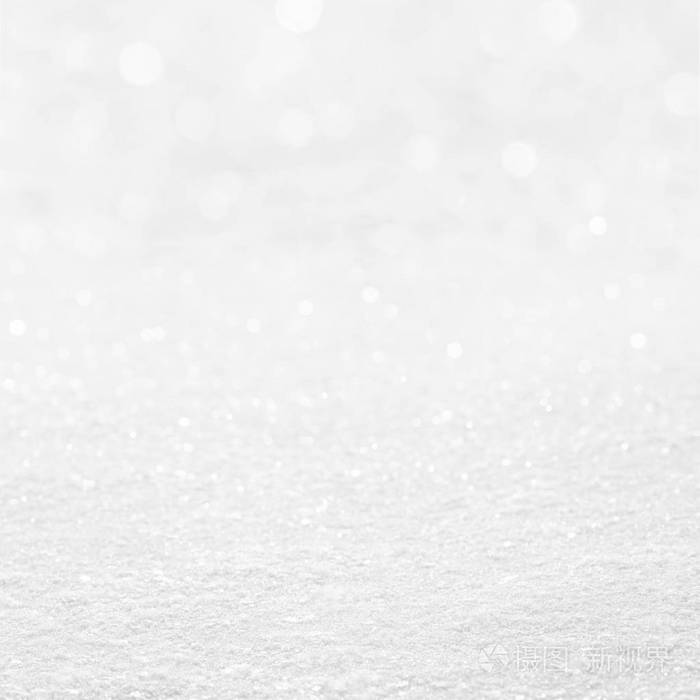 白色的雪花和模糊散景圣诞节背景