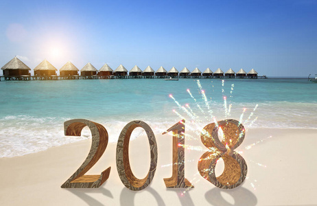 新年铭文2018在沙滩上的沙子。