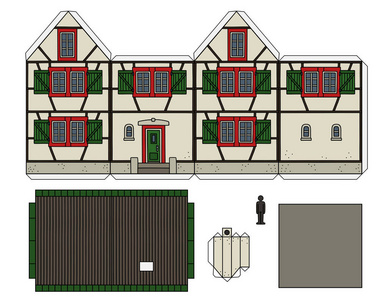 旧的半木制房子的纸模型