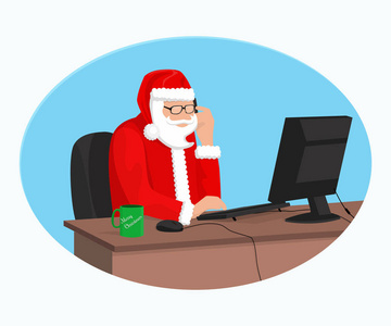 现代的圣诞老人在电脑上工作