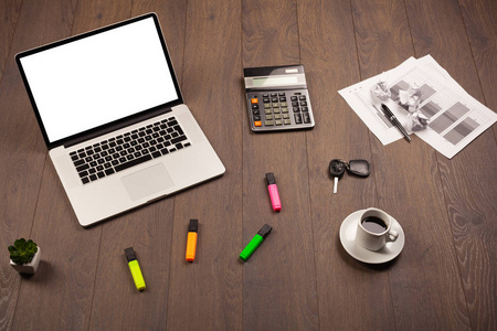 商务办公桌，办公用品和现代笔记本电脑白色黑色