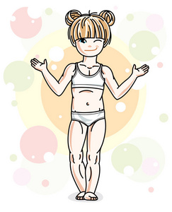 可爱的金发小女孩穿着内衣站在五颜六色的背景上,泡泡和圆圈.