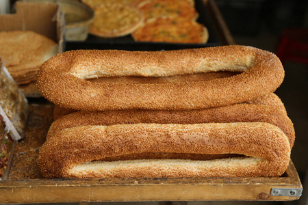 ak beigele bread rings sprinkled with sesame seeds for sale in t